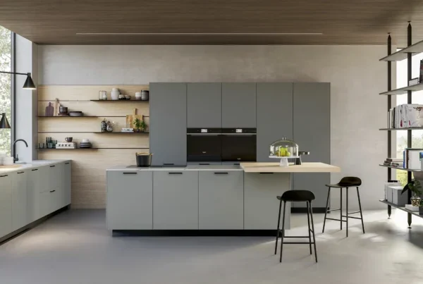 Cucina Doimo Cucine grigio salvia con penisola e piano snack